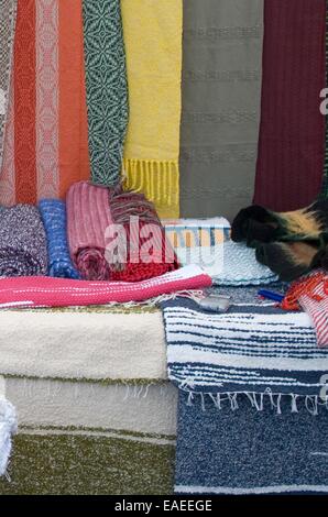 Cotton shawls and floor coverings. Photographed at the Ethnic Fair September 27, 2014 years. Stock Photo