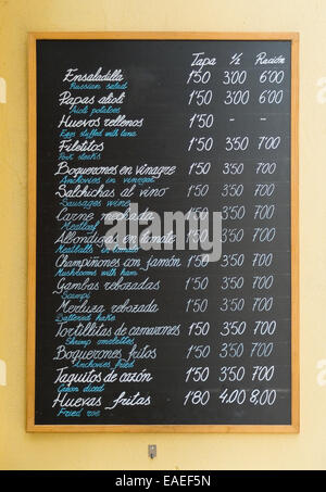 Tapas blackboard plaque in a wall. Stock Photo