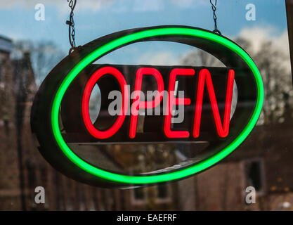 Neon open sign in a shop window Stock Photo