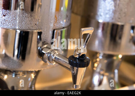 stainless steel water containers with condensation Stock Photo