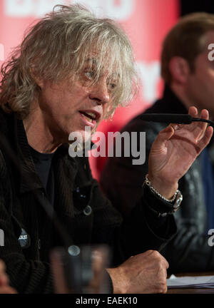 Berlin, Germany. 13th Nov, 2014. Musician Bob Geldof speaks durign the start of #BandAid30 Germany in Berlin, Germany, 13 November 2014. A Christmas song will be produced with more than 25 German bands with 100 percent of the proceed going to help people infected with Ebola. Credit:  dpa picture alliance/Alamy Live News Stock Photo