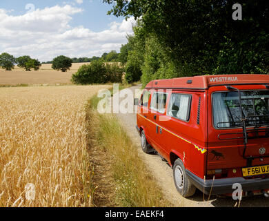 A Volkswagen T3 (or T25 Transporter) camper van as converted by the official VW camper converters Westfalia of Germany being dri Stock Photo