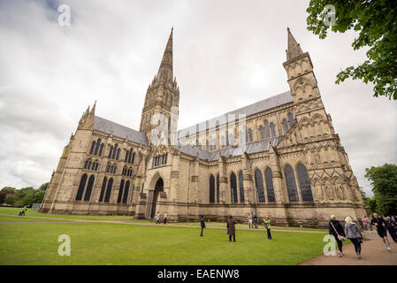 SALISBURY, UNITED KINGDOM - JUNE 4, 2014: Visitors to Salisbury Cathedral, UK, on a cloudy spring morning Stock Photo