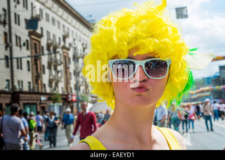 Young girl in Moscow wearing yellow wig. Stock Photo