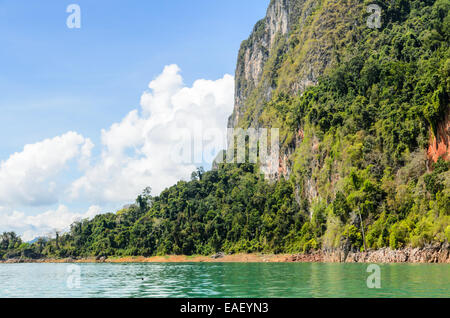 Beautiful mountain surrounded by water, Natural attractions at Ratchapapha dam in Khao Sok National Park, Surat Thani province,  Stock Photo