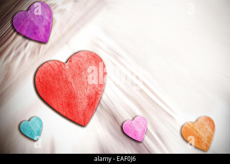 Wooden hearts on timbered background, space for text. Stock Photo