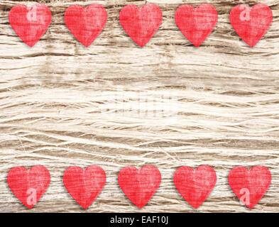 Wooden hearts on timbered background, space for text. Stock Photo
