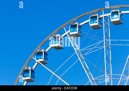 Ferris wheel over blue sky background Stock Photo