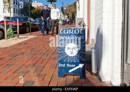 Tarot reading sign on sidewalk - Georgetown, Washington, DC USA Stock Photo