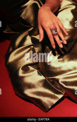 Berlin, Germany. 13th Nov, 2014. A model displays a Beijing-themed ring during a release event for the new creation of French designer Catherine Plouchard in Berlin, Germany, on Nov. 13, 2014. © Zhang Fan/Xinhua/Alamy Live News Stock Photo