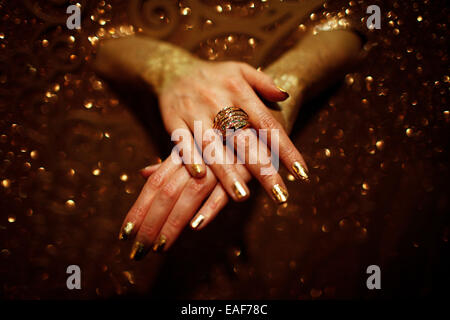 Berlin, Germany. 13th Nov, 2014. A model displays a Vienna-themed ring during a release event for the new creation of French designer Catherine Plouchard in Berlin, Germany, on Nov. 13, 2014. © Zhang Fan/Xinhua/Alamy Live News Stock Photo