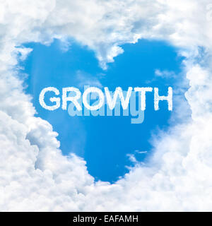 growth word inside love cloud heart shape blue sky background only Stock Photo