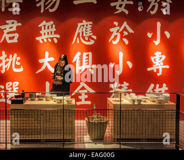 Woman looking at noodle bowls in the Chinese shop ( Toko ) of  the new Market hall, Rotterdam, South Holland, The Netherlands. Stock Photo