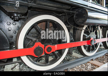 Closeup detail of wheels on old railway engine Stock Photo