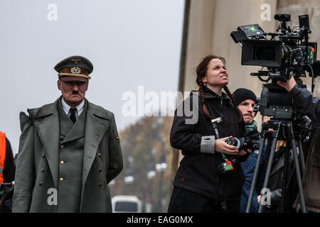 Berlin, Germany. 14th November, 2014. Actor Oliver Masucci at the Brandenburg Gate, Berlin, filming Look Who's Back playing the part of Adolf Hitler. Credit:  Georgia Chapman/Alamy Live News Stock Photo