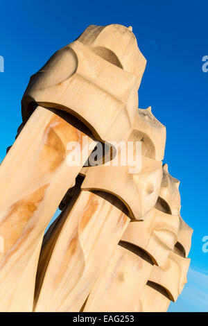 Chimneys or ventilation towers on the rooftop of Casa Mila or La Pedrera, Barcelona, Catalonia, Spain Stock Photo