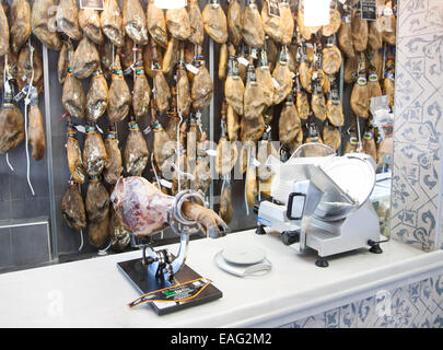 Close up display of cured hams inside a specialist shop in Bario Macarena, Seville, Spain Stock Photo