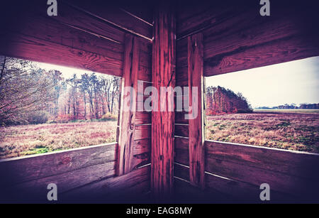 Vintage filtered interior of hunting tower in autumn season. Stock Photo
