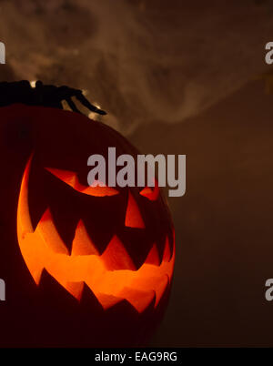 Scary Halloween yellow pumpkin face isolated on white background with ...