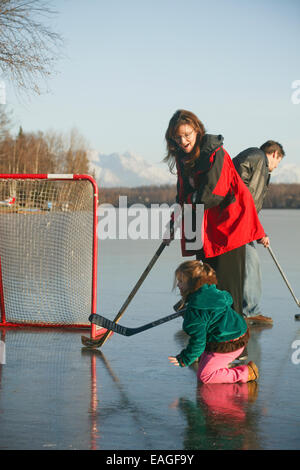 Sarah Palin Plays Hockey With Daughter On Frozen Lake Lucille In Wasilla, Alaska 2005 Stock Photo