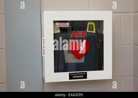 aed automated external defibrillator installed in a high school public place Saskatchewan Canada Stock Photo