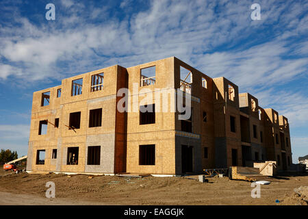 typical timber framed condominium block construction with sheet panels Saskatchewan Canada Stock Photo