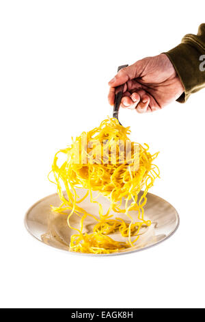 tagliolini in brodo isolated over a white background Stock Photo