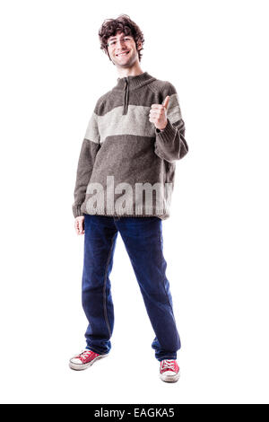 an handsome guy, maybe a student, in casual clothing with thumbs up. isolated over white Stock Photo