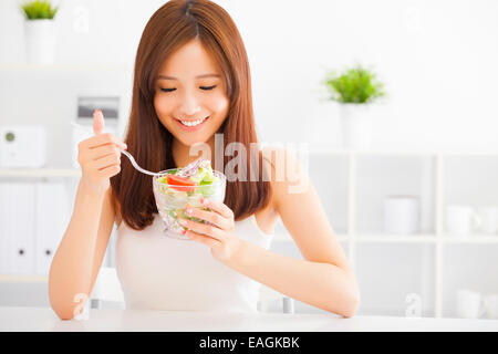 beautiful asian young woman eating healthy food Stock Photo