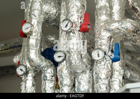 Close-up of some pipes and valves for warm watter Stock Photo