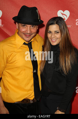 Mix Master Mike and Dianne Copeland attending the 10th annual MusiCares
