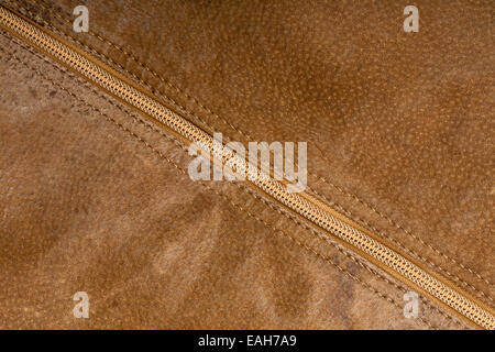 Scratched worn suede texture with seam Stock Photo