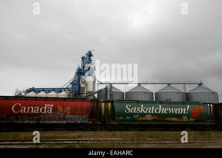 canada and saskatchewan freight grain trucks on canadian pacific railway Saskatchewan Canada Stock Photo