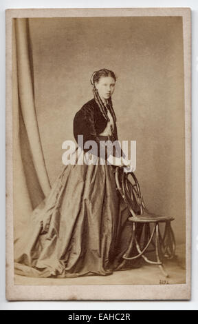 Victorian carte-de-visite, portrait of a young woman.  Taken by an unknown photographer circa 1870 Stock Photo