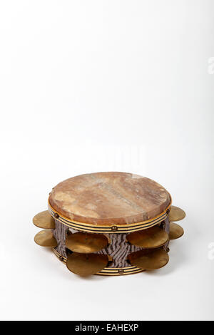 Large heavy Riq tambourine from Egypt, played balnaced on the leg Stock Photo