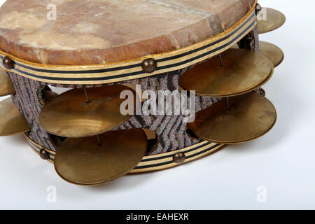 Large heavy Riq tambourine from Egypt, played balnaced on the leg Stock Photo