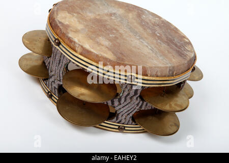 Large heavy Riq tambourine from Egypt, played balnaced on the leg Stock Photo