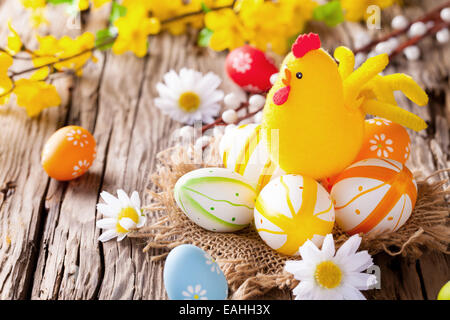 Easter still life with traditional decorative colored eggs in nest Stock Photo