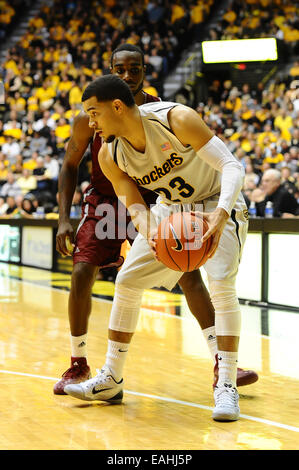 Wichita, Kansas, USA. 14th Nov, 2014. Wichita State Shockers guard Fred VanVleet (23) secures the ball from the defense during the NCAA Basketball game between the New Mexico State Aggies and the Wichita State Shockers at Charles Koch Arena in Wichita, Kansas. Kendall Shaw/CSM/Alamy Live News Stock Photo