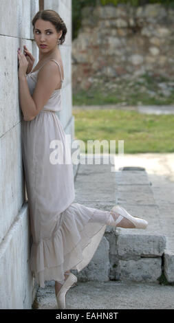 on the top of her toes Stock Photo