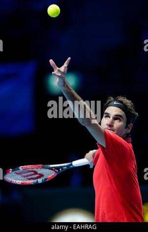 London, UK. 15th Nov, 2014. ATP World Tour Finals. Roger Federer versus Stan Wawrinka, semi-final. Roger Federer serves Credit:  Action Plus Sports/Alamy Live News Stock Photo