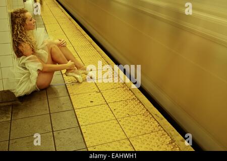 Classic ballerina with tutu dancing in the New York Subway. Stock Photo