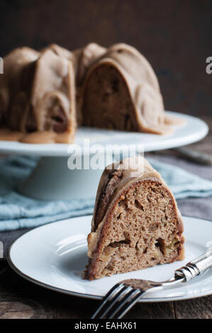 Delicious spice bundt cake with caramel frosting Stock Photo