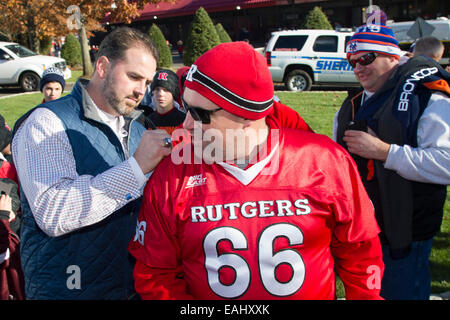 Piscataway, New Jersey, USA. 15th Nov, 2014.  Former New York Giants player Shaun O'Hara signs autographs for fans during the game between The Indiana Hoosiers and Rutgers Scarlet Knights at Highpoint Solutions Stadium in Piscataway, NJ. The Rutgers Scarlet Knights defeat The Indiana Hoosiers 45-23. Credit:  Cal Sport Media/Alamy Live News Stock Photo