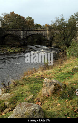The Wharfe with Bardon Bridge in the background from Dales Way in Wharfedate at Bolton Abbey, Skipton, North Yorkshire, England Stock Photo