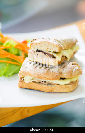 vegetarian tuna and cheese toasted baguette sandwich with side salad Stock Photo