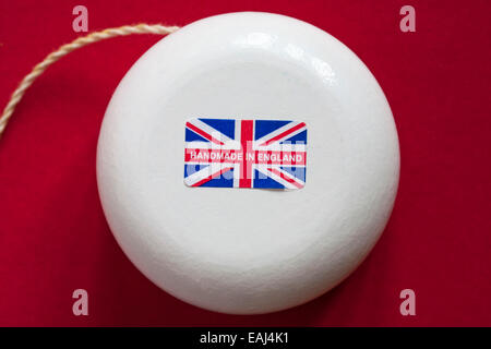 Handmade in England Union Jack label on yoyo set on red background Stock Photo