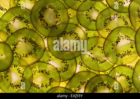 Kiwi fruit sliced as a background, top view Stock Photo