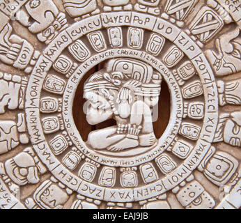 Fragment of the Mayan symbolic sun carved on the stone