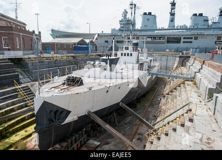 HMS M33 is a British Royal Navy ship built in 1915 and is now in dry dock at Portsmouth Historic Dockyard. Stock Photo